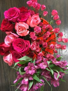 Various pink roses, purple astroemeria & bi-color pink spray roses